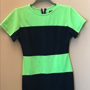 Knee length pencil dress. Neon green and navy blue